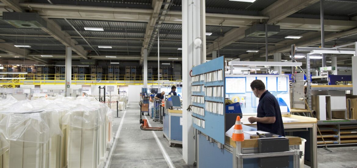 Workers in paper packaging factory